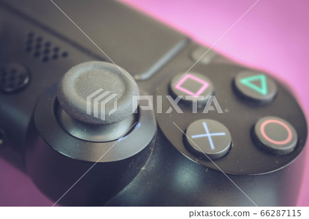 A beautiful black modern digital game joystick A beautiful black modern digital game joystick 66287115