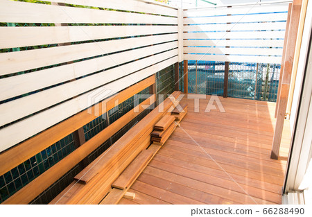 In the middle of making a wood deck in the garden In the middle of making a wood deck in the garden 66288490