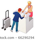 Two people interact near the reception or counter 66290294