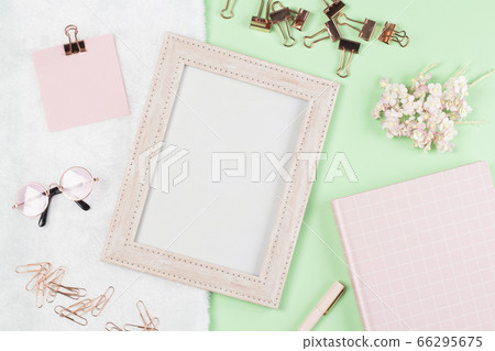 flat lay stationery on work desk in green pastel background flat lay stationery on work desk in green pastel background 66295675