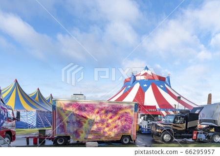 Circus caravanes in front the red and white circus Circus caravanes in front the red and white circus 66295957