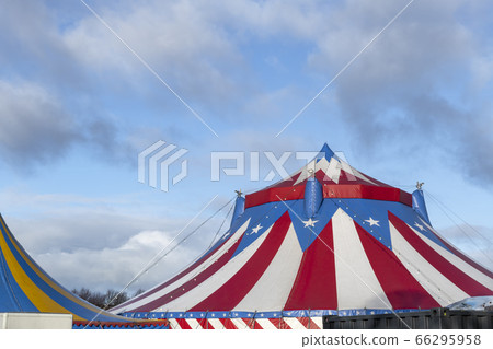 Red and white circus tent topped with bleu starred Red and white circus tent topped with bleu starred 66295958