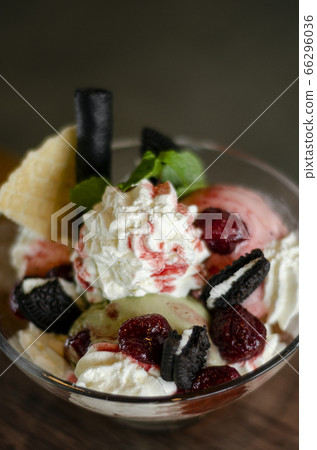 raspberry and pistachio ice cream sundae dessert 66296036