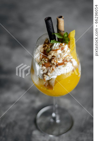 mango and passion fruit tropical ice cream sundae mango and passion fruit tropical ice cream sundae 66296054