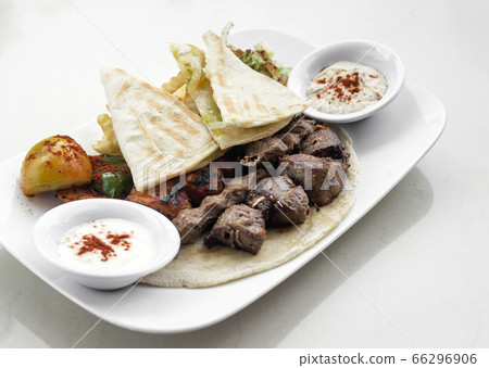 lebanese meshwi mixed grilled meat set on plate 66296906