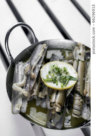 razor clams sauteed with garlic butter white wine razor clams sauteed with garlic butter white wine 66296918