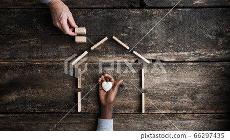 Conceptual image of adoption and safety 66297435