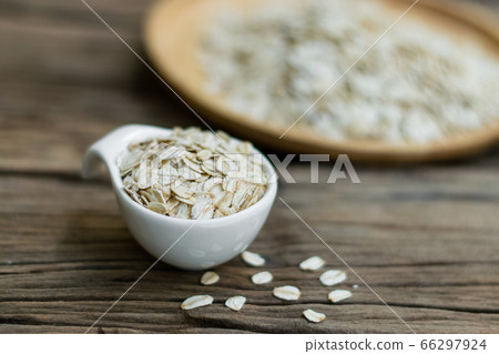 Oatmeal on old wood 66297924