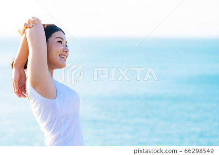 Female health image sea background 66298549