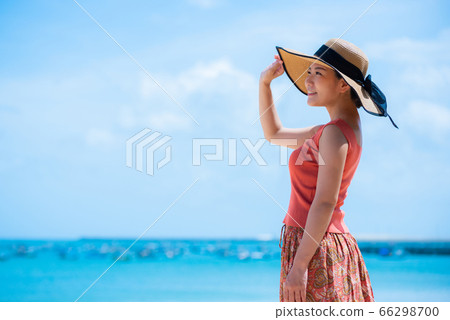 Woman in the summer sea 66298700