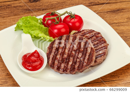 Grilled burger cutlet with sauce Grilled burger cutlet with sauce 66299009