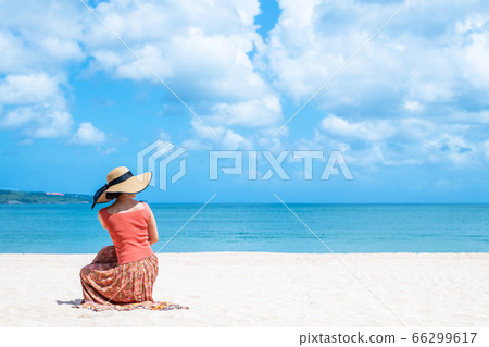 Woman in the summer sea Woman in the summer sea 66299617
