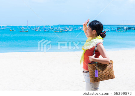 Woman in the summer sea Woman in the summer sea 66299873