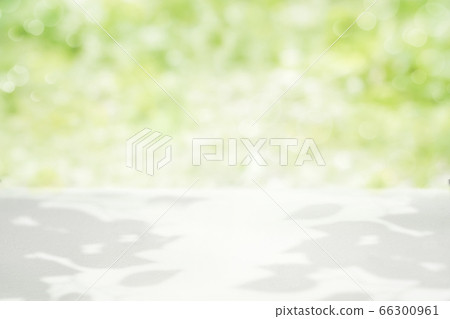 Product background Fresh green sunbeams table and field 66300961