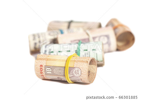 Rolls of Indian rupees isolated on white Rolls of Indian rupees isolated on white 66301885