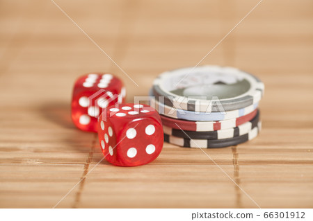 two red dices and gambling chips 66301912