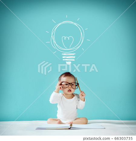 Concept, idea of happy little baby with bulb at 66303735