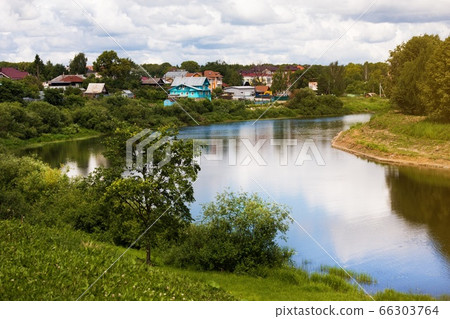 View on river and district with old wooden houses. 66303764