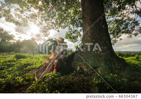 Asian grandmother fisherman with the net bamboo 66304367