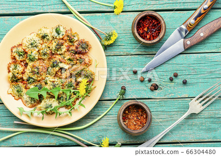 Fried dandelion flowers Fried dandelion flowers 66304480