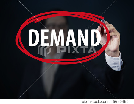 Businessman hand writing "DEMAND" with red marker Businessman hand writing "DEMAND" with red marker 66304601