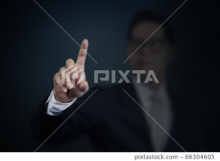 Businessman pushing a transparent screen. Business 66304605
