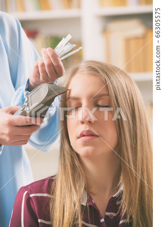 Therapist finding an acupuncture point Therapist finding an acupuncture point 66305575