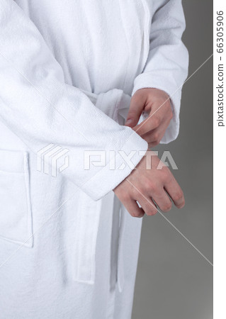 man in a white coat on a gray background man in a white coat on a gray background 66305906