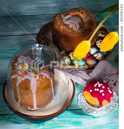 Easter composition with colorful eggs and cakes 66306143