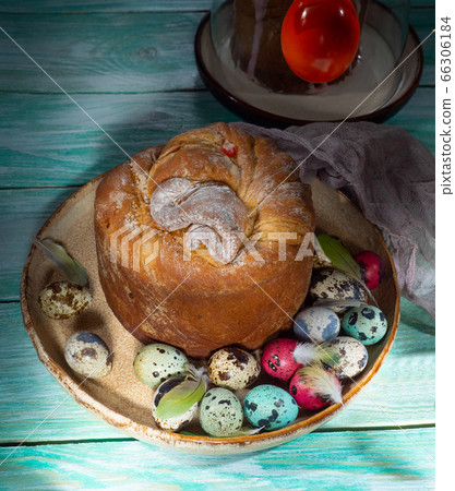 Easter composition with colorful eggs and cakes Easter composition with colorful eggs and cakes 66306184