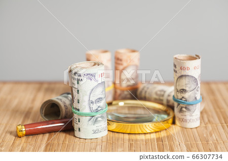 Rolls of Indian Currency Rupee Notes with Rolls of Indian Currency Rupee Notes with 66307734