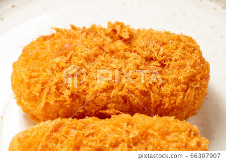 Bales-shaped cream croquette placed on a plate. Bales-shaped cream croquette placed on a plate. 66307907