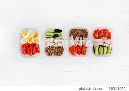 Chicken breast and vegetables in containers. Flat lay 66311051