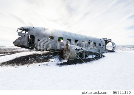 Solheimasandur the plane wreck view during winter snow Solheimasandur the plane wreck view during winter snow 66311350