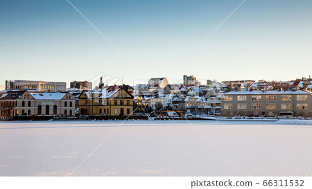 Tjornin Lake view during winter which is a prominent small lake in central Reykjavik Tjornin Lake view during winter which is a prominent small lake in central Reykjavik 66311532