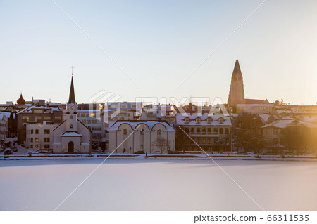 Tjornin Lake view during winter which is a prominent small lake in central Reykjavik Tjornin Lake view during winter which is a prominent small lake in central Reykjavik 66311535