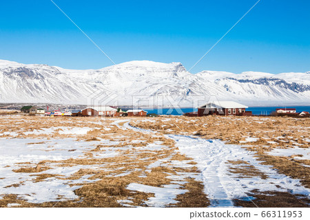 Arnarstapi or Stapi is a small fishing village at the foot of Mountain Stapafell Arnarstapi or Stapi is a small fishing village at the foot of Mountain Stapafell 66311953