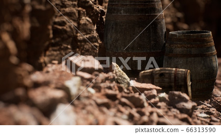 old wooden vintage wine barrels near stone wall in 66313590