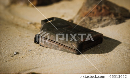 old rusty fuel canister in the desert old rusty fuel canister in the desert 66313632