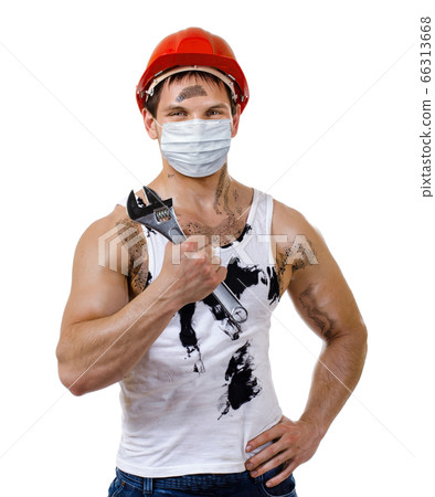 worker man in safety mask on face hold big worker man in safety mask on face hold big 66313668