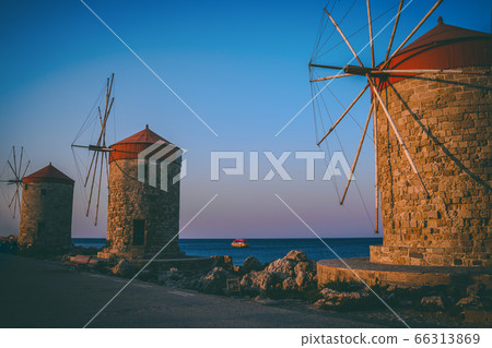 Windmills in the port of Rhodes, Greece Windmills in the port of Rhodes, Greece 66313869