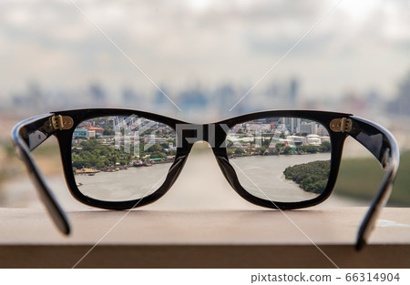 View through the lens of glasses. 66314904