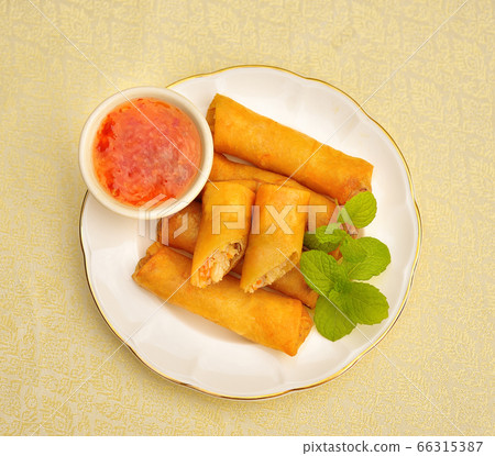 deep fried spring rolls on white plate deep fried spring rolls on white plate 66315387