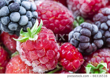 Close-up view on frozen fresh raspberries on a Close-up view on frozen fresh raspberries on a 66316516