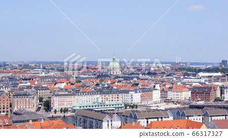 COPENHAGEN, DENMARK - JUL 06th, 2015: Skyline of Copenhagen from Vor Frelsers Kirke Church of Our Saviour COPENHAGEN, DENMARK - JUL 06th, 2015: Skyline of Copenhagen from Vor Frelsers Kirke Church of Our Saviour 66317327