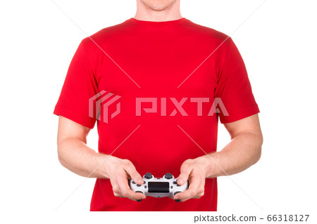 Man in red t-shirt holding gamepad and playing video games isolated white Man in red t-shirt holding gamepad and playing video games isolated white 66318127