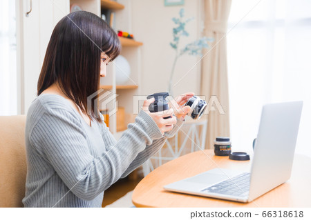 A woman copy space to replace the camera lens A woman copy space to replace the camera lens 66318618