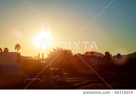Truck cars on a highway at sunrise with beautiful 66318854
