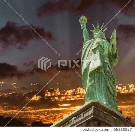 The Statue of Liberty blue sky orange yellow 66318857