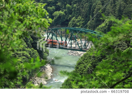 Kyoto/Hozukyo Railway Bridge and trolley train Kyoto/Hozukyo Railway Bridge and trolley train 66319708